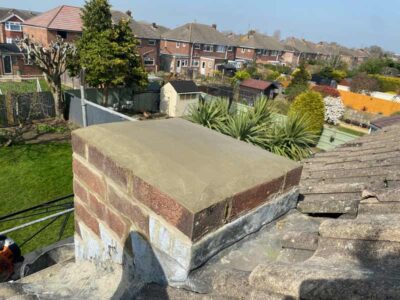 Chimney reduced in height capped off and re-pointed for property in the Southwest