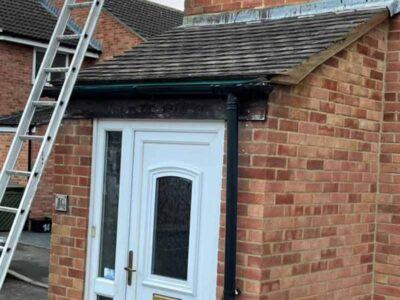 Roof tile repairs to porch of house in the Southwest DBF Roofing repairs